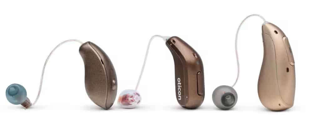 Starkey Omega AI next to Phonak Audéo Sphere Infinio and Oticon Intent.